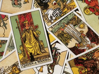Picture of the Queen of Wands tarot card from the original Rider Waite tarot deck with mixed tarot...