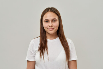 Portrait of smiling female teenage look at camera