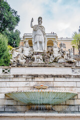 Ancient famous statue sof Neptune fountain at Piazza del Popolo, Rome, Italy. - obrazy, fototapety, plakaty