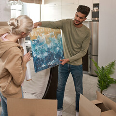 Man and girl packing picture with stretch film