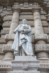 Statue of Romagnosi at the main city courthouse in Rome historical downtown, Italy.