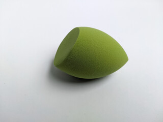Green beauty blender sponge isolated on white