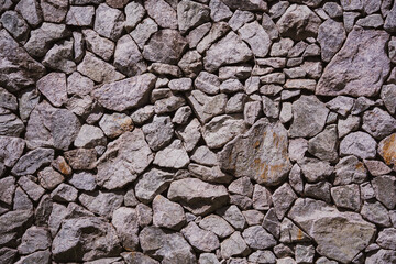 Background and texture of old stoned wall