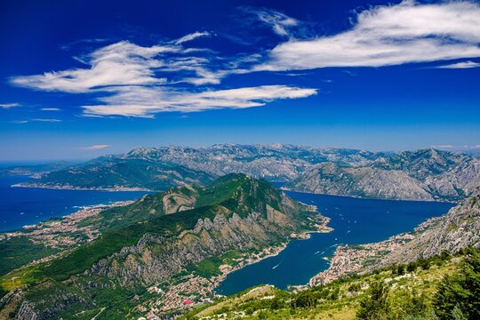 Aerial of the Vrmac mountain under a cloudy sky in Kotor bay, Montenegro