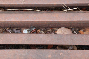 Rusty surface of old iron railroad tracks.