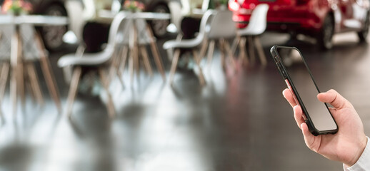 Obraz premium Hand hold smartphone to email business information email message marketing digital business concept cloud to person reading send e-mail on smartphone to message