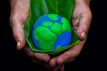 World Earth Day. ESG concept of environmental, Environmental and Ecology Care. Hand Holding Green Globe.