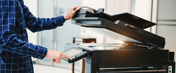 Copier printer, Close up hand office man press copy button on panel to using the copier or...