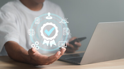 Businessman show the sign of the top service Quality assurance, Guarantee, Standards, ISO certification and standardization concept, satisfaction, service experience.