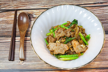 Stir fried rice noodles with soy sauce, Thai food Pad See Ew.