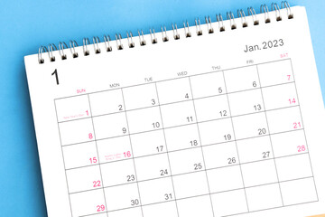 calendar January 2023 top view on a blue background