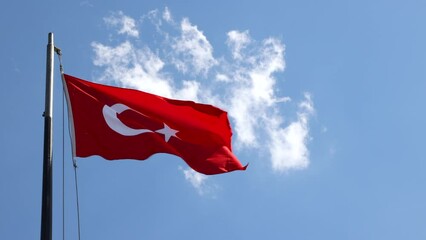 Turkish flag waving against the cloudy sky. Turkish national holidays video. 29th october republic day or cumhuriyet bayrami or 19th may or 30th august or zafer bayrami background video.