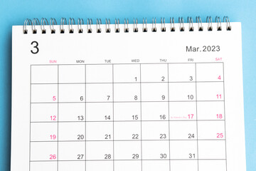 calendar March 2023 top view new year concept on a blue background