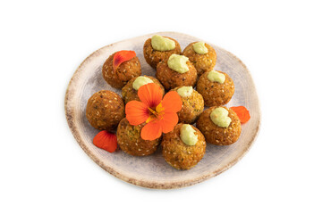 Falafel with guacamole isolated on white. Side view.