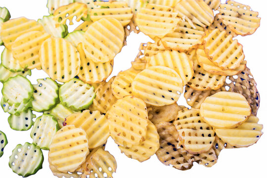 Heap of Fresh raw organic potato chips slices as background texture