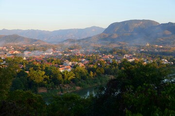 Stunning sunset and view of the town from the top of the Phousi Hill in Luang Prabang, Laos