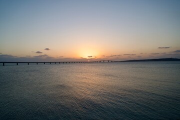 Naklejka premium View of Irabu Island and Irabu Bridge at sunset from Miyako Island