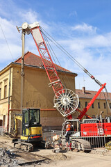 Crane and drilling machinery at the construction site
