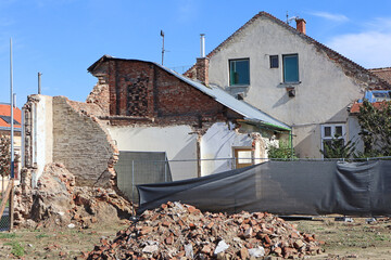 Demolition of an old ruined building in the city