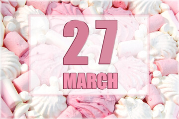 calendar date on the background of white and pink marshmallows. March 27 is the twenty-seventh day of the month