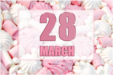 calendar date on the background of white and pink marshmallows. March 28 is the twenty-eighth day of the month