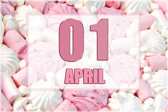 calendar date on the background of white and pink marshmallows. April 1 - the first day of the month