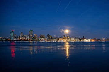 Fototapeta na wymiar Liverpool waterfront illuminated at night