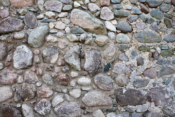 Texture of stone old masonry of a medieval castle
