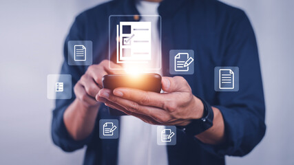 Businessman using computer Document Management System (DMS), online documentation database process automation to efficiently manage files