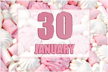 calendar date on the background of white and pink marshmallows. January 30 is the thirtieth day of the month