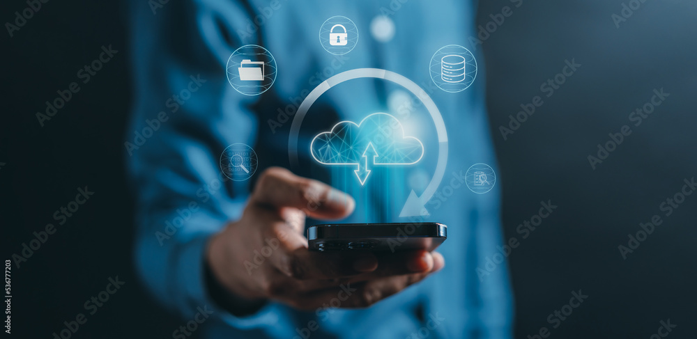 Leinwandbilder Businessman using smart phone cloud computing to download and loading data information and upload on system network application. Technology transformation concept