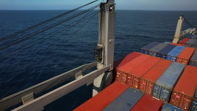 Kingston anchorage, Jamaica - 12.15.2021 View of container ship cargo crane Mac Gregor maker for loading operations