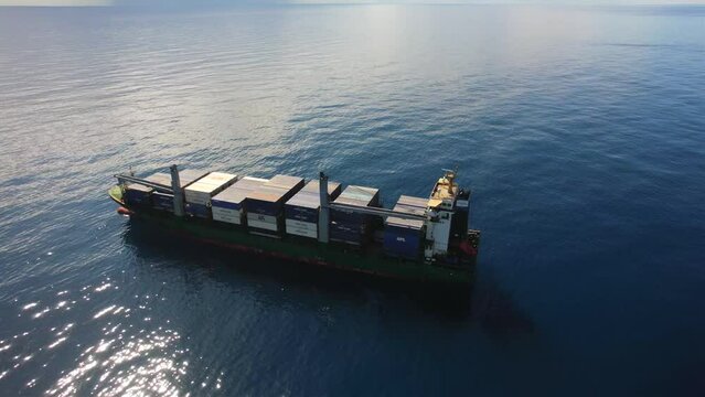Kingston anchorage, Jamaica - 12.15.2021 Aero view of container ship CMA CGM Ventania at anchorage near Kingston port awaiting for berth during very calm weather