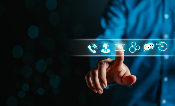 Businessman hand touching on virtual tab contact icons. Contact us or Customer support hotline people connect. ( email, address, live chat, internet wifi )