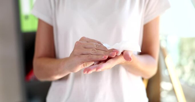 We wipe our hands with a disposable antibacterial wet towel