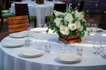 Served tables at beautiful interior of cafe or restaurant