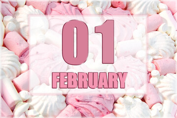 calendar date on the background of white and pink marshmallows.  February 1 is the first day of the month