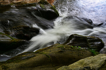 water flowing over rocks in the mountains of north Macedonia