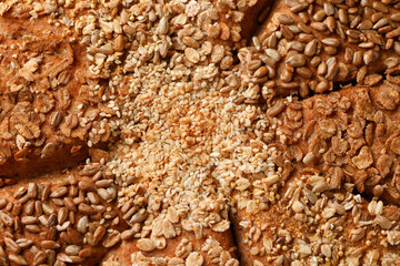 Fresh Homemade seeded share bread. macro background photo