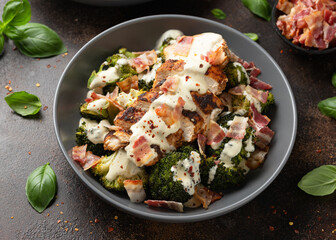 Baked chicken, broccoli with creamy cheese sauce and bacon