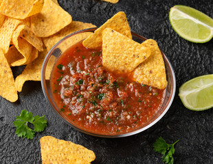 Mexican Tomato Salsa with lime, onion, jalapeno pepper, parsley and tortilla chips