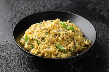 Creamy Garlic and parmesan orzo pasta with lemon zest and parsley