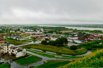 Fototapeta na wymiar Tabolsk, Russia - June 13, 2022: View of the city of Tobolsk from the Tobolsk Kremlin on Alafei Hill