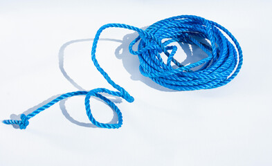 Close up view of blue rope isolated on white background - Powered by Adobe