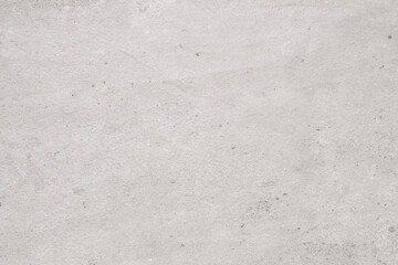 Fototapeta premium Plaster texture. Light background. Stony wall. Grained white surface of irregular smears cover copy space for text logo.