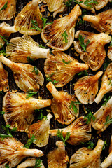 Oyster mushrooms in an aromatic marinade, prepared for grilling, top view - obrazy, fototapety, plakaty