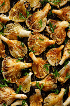 Oyster mushrooms in an aromatic marinade, prepared for grilling, top view