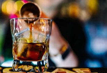 woman hand bartender making cocktail in bar