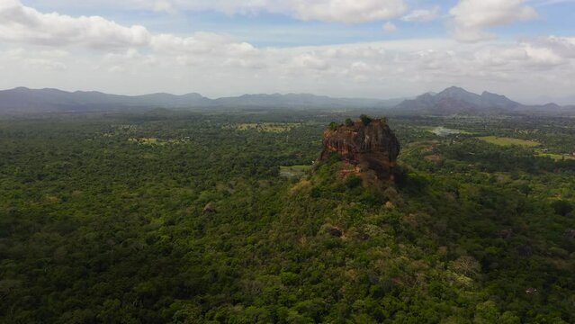 Aerial view of Sigiriya Rock or Lion Rock near Dambulla in Sri Lanka. Green rainforest and jungle.