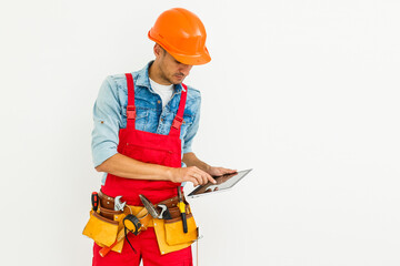 Construction Worker with a tablet. Planning Developer Concept